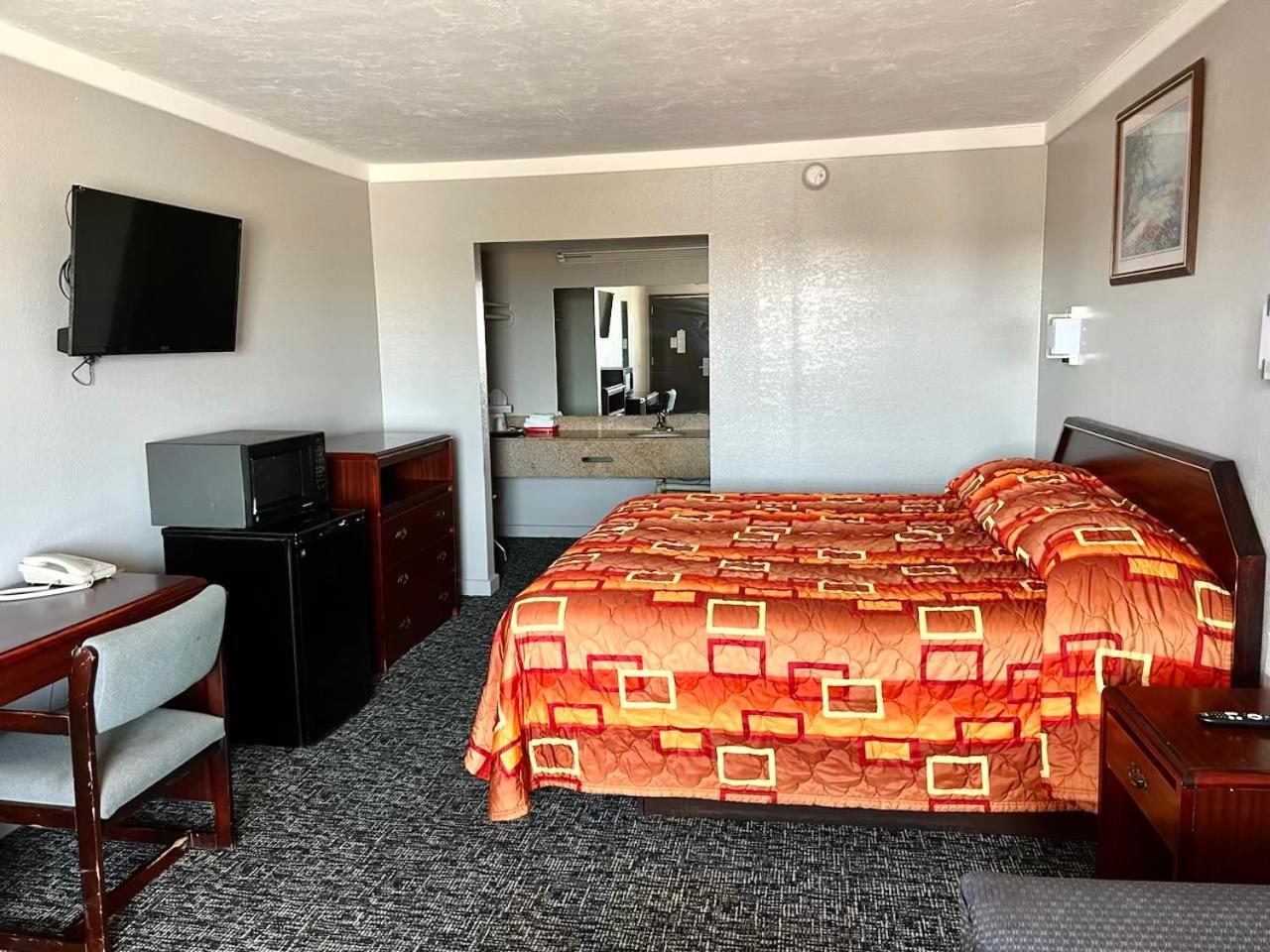 Hotel 81 El Reno Bagian luar foto